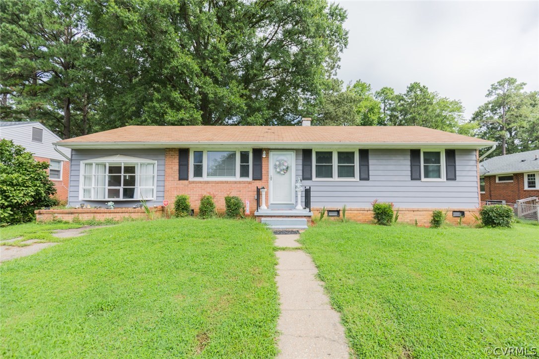 2918 Woodworth Road North Chesterfield, VA 23237 - Photo 3 of 16 a front view of a house with a yard