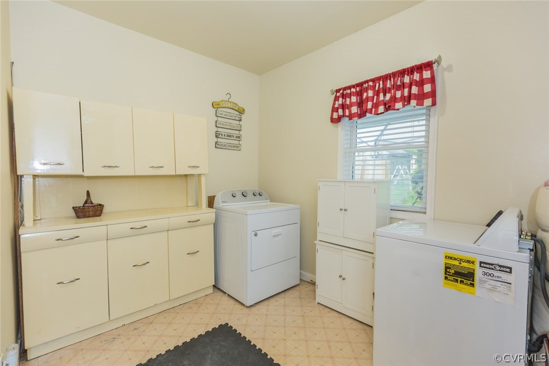 2918 Woodworth Road North Chesterfield, VA 23237 - Photo 5 of 16 a utility room with cabinets washer and dryer