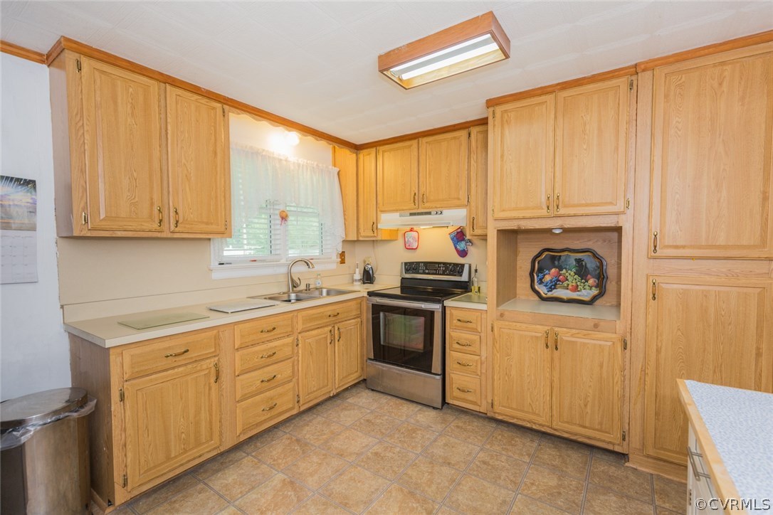 2918 Woodworth Road North Chesterfield, VA 23237 - Photo 7 of 16 a kitchen with stainless steel appliances granite countertop a stove a sink and white cabinets with wooden floor