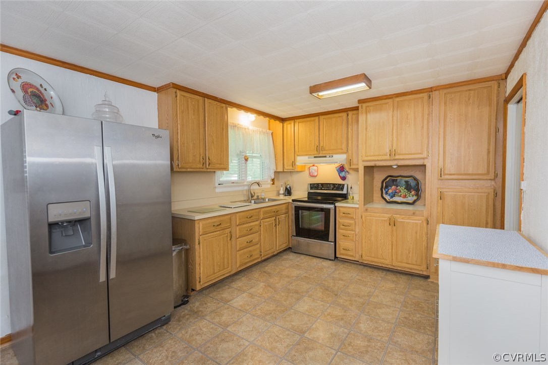 2918 Woodworth Road North Chesterfield, VA 23237 - Photo 8 of 16 a kitchen with a refrigerator a stove a sink and a window