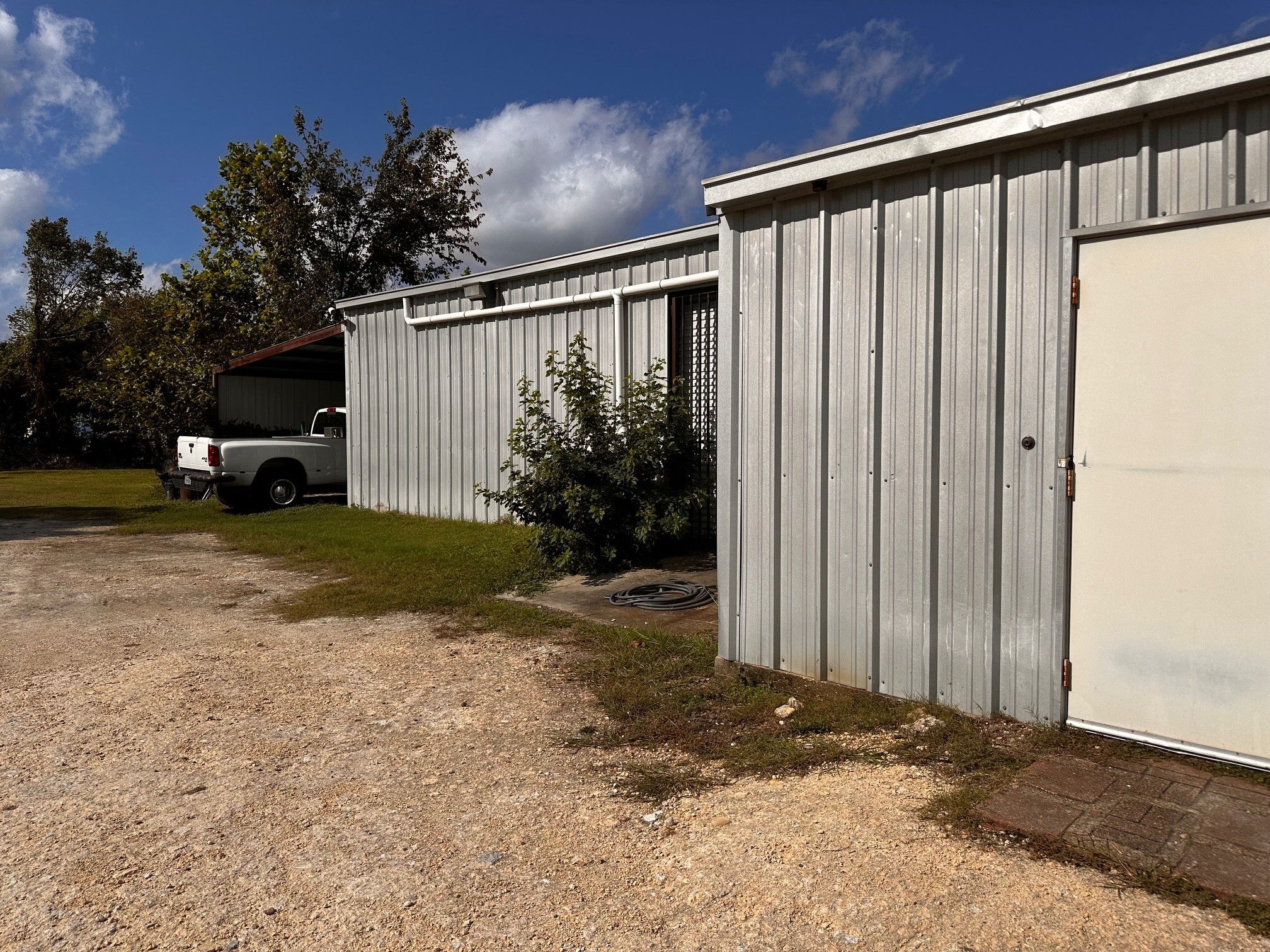 404 Gulf Bank Road Houston, TX 77037 - Photo 17 of 23 a view of a house with backyard and sitting area