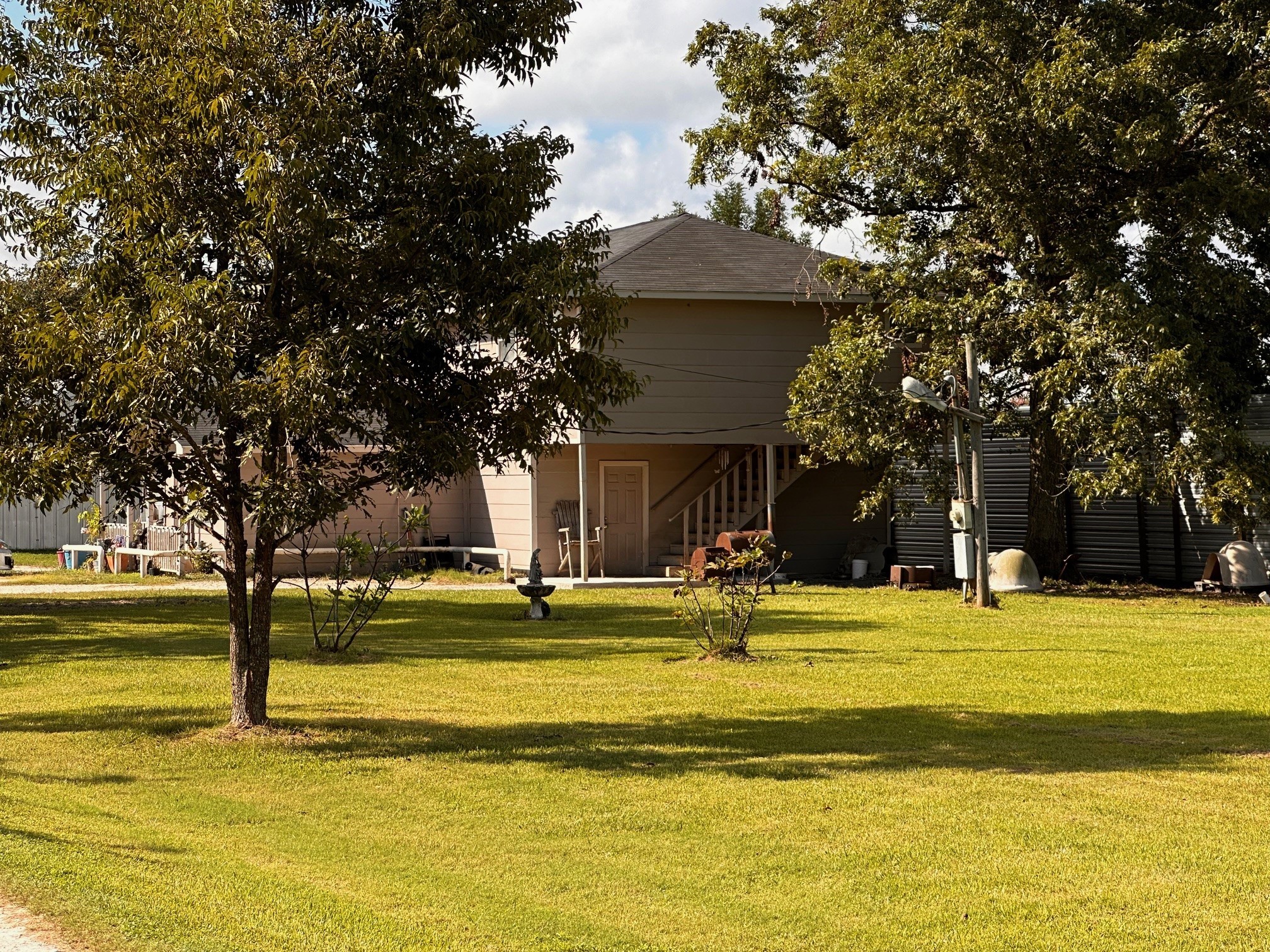 404 Gulf Bank Road Houston, TX 77037 - Photo 2 of 23 a view of a swimming pool with an outdoor space and seating area