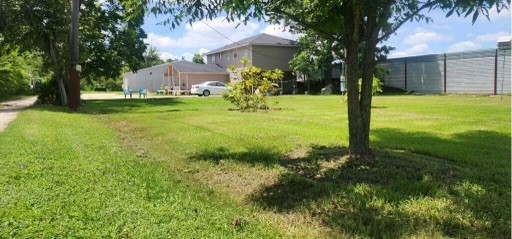 404 Gulf Bank Road Houston, TX 77037 - Photo 7 of 23 a view of a garden with a tree