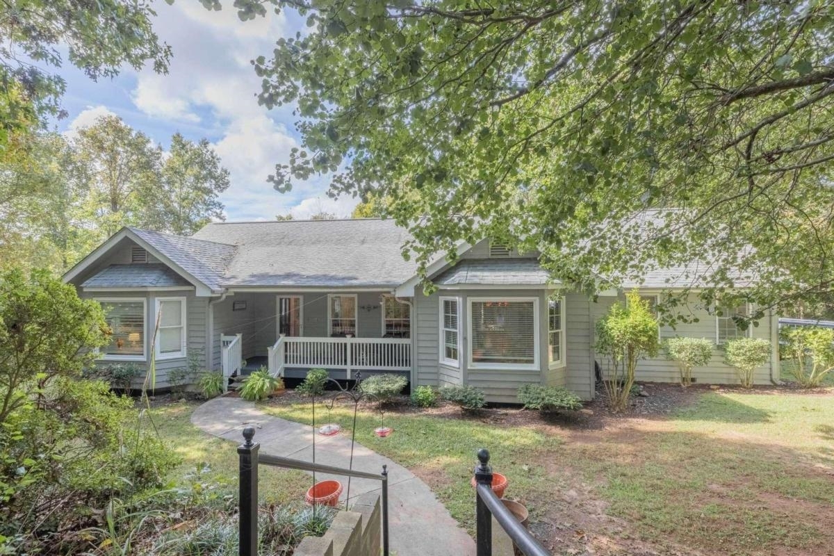 3045 Ridgeland Road Eastanollee, GA 30538 - Photo 1 of 1 a view of house with outdoor seating area