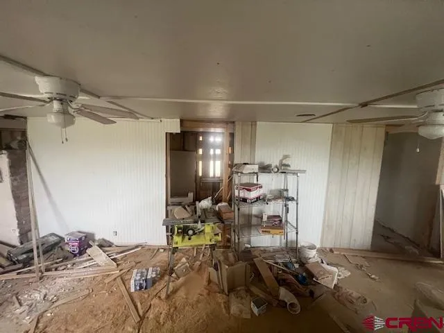 a view of a room with chairs and toys