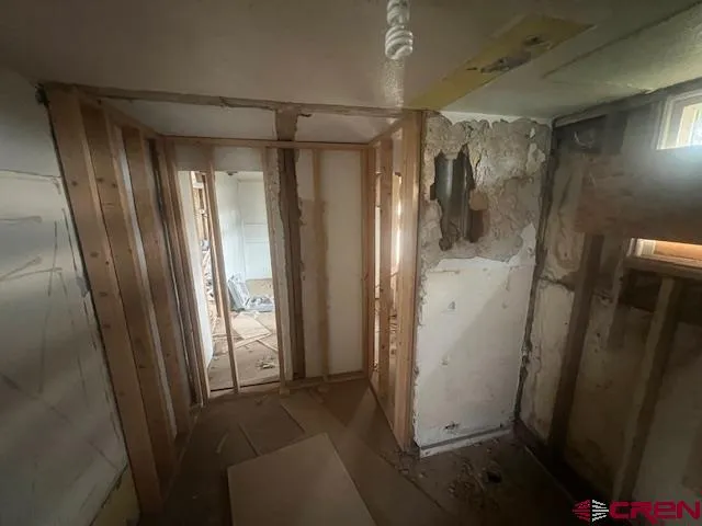 a view of entryway with wooden walls