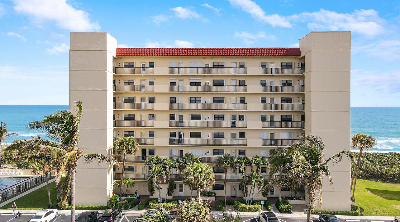7410 South Ocean Drive, Unit 505 Jensen Beach, FL 34957 - Photo 20 of 33 a view of a building with a garden