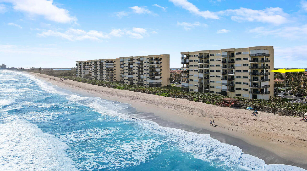 7410 South Ocean Drive, Unit 505 Jensen Beach, FL 34957 - Photo 26 of 33 a city view with tall buildings
