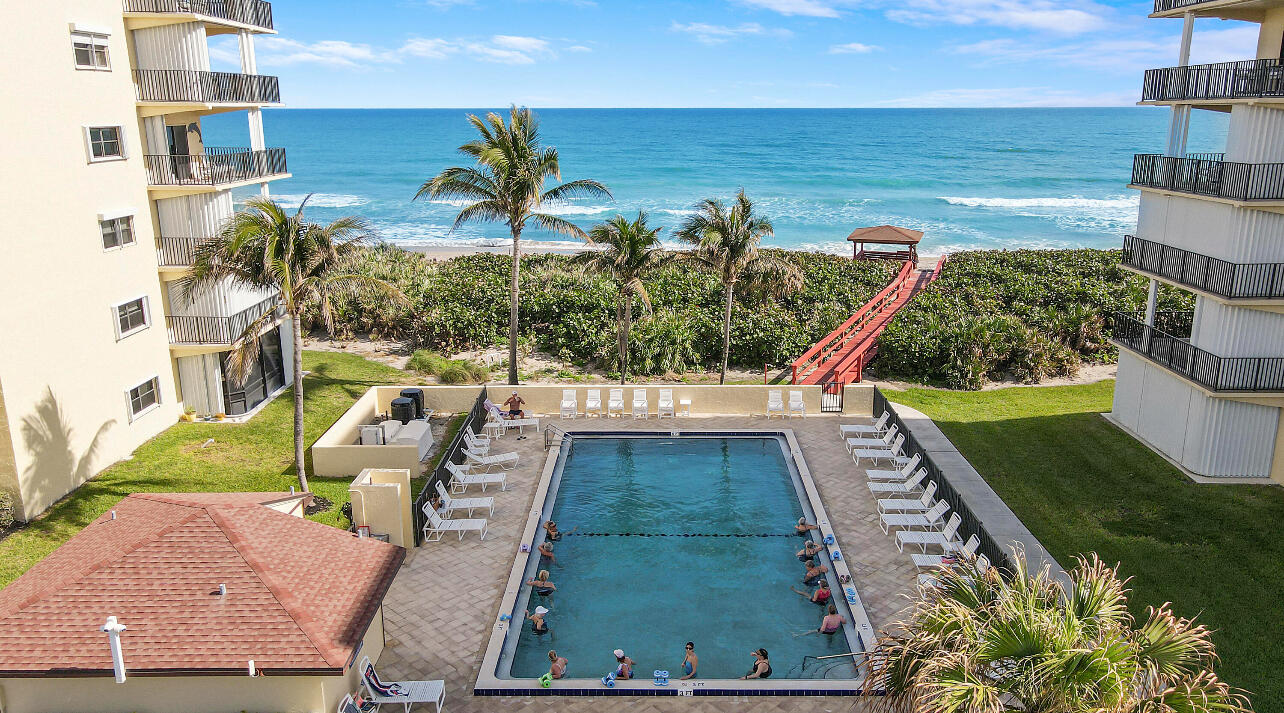 7410 South Ocean Drive, Unit 505 Jensen Beach, FL 34957 - Photo 32 of 33 a view of swimming pool from a balcony