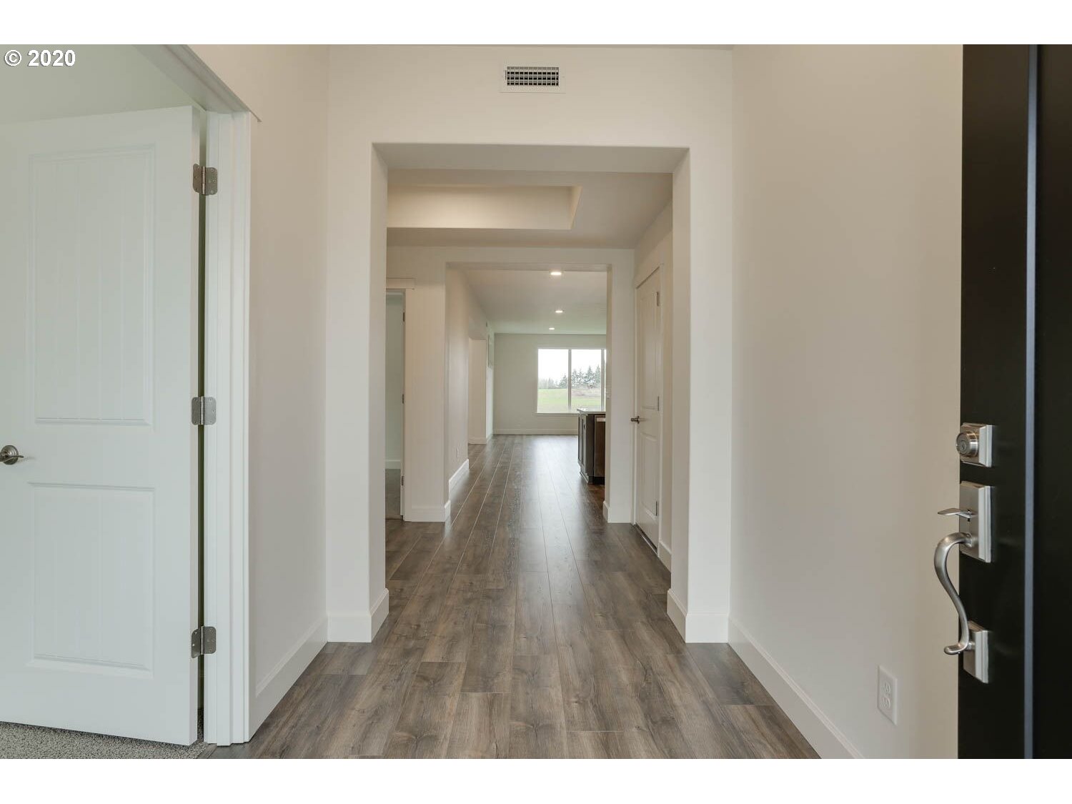 4260 South 11th Way Ridgefield, WA 98642 - Photo 2 of 18 a view of hallway with wooden floor