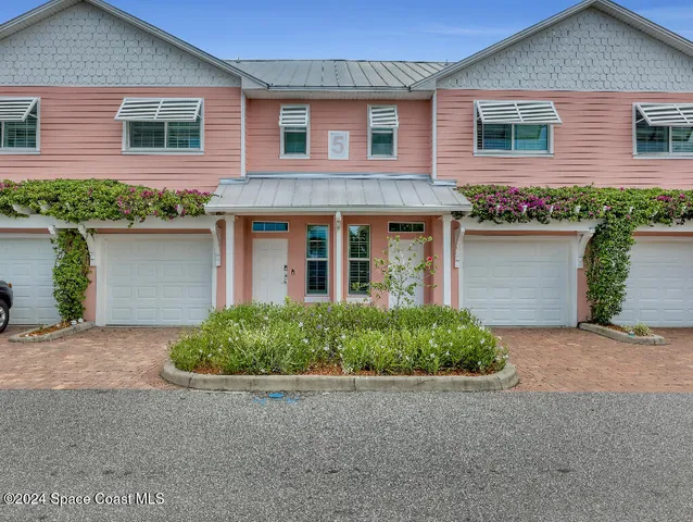 front view of a house and a yard