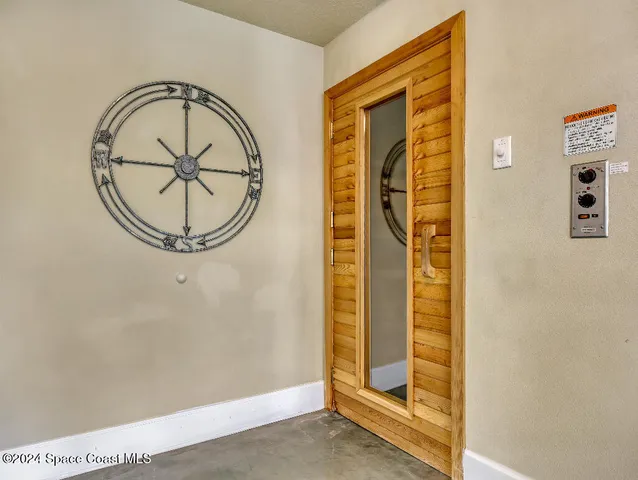 an entryway view with wooden floor