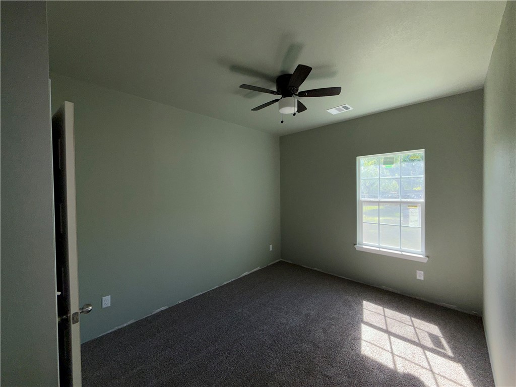1614 Conlee Street Bryan, TX 77803 - Photo 12 of 20 a view of empty room with windows