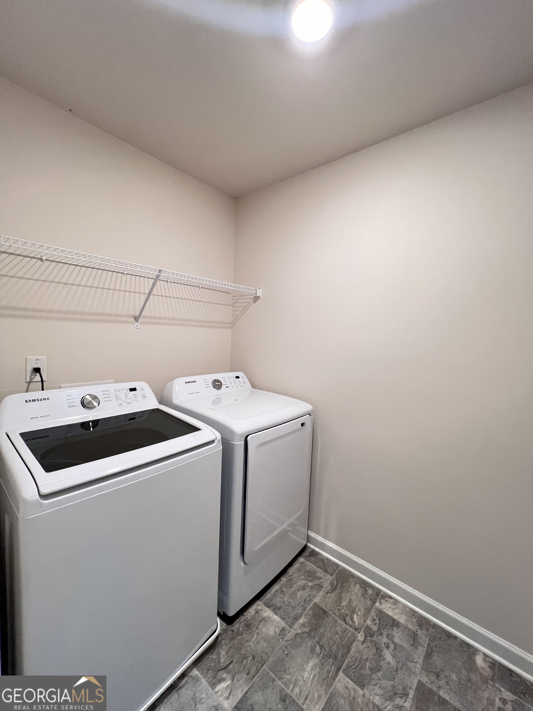 393 Walnut Grove Way Pendergrass, GA 30567 - Photo 13 of 22 a utility room with dryer and washer
