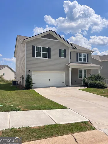 a front view of house with yard
