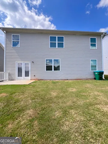 a house view with a garden space