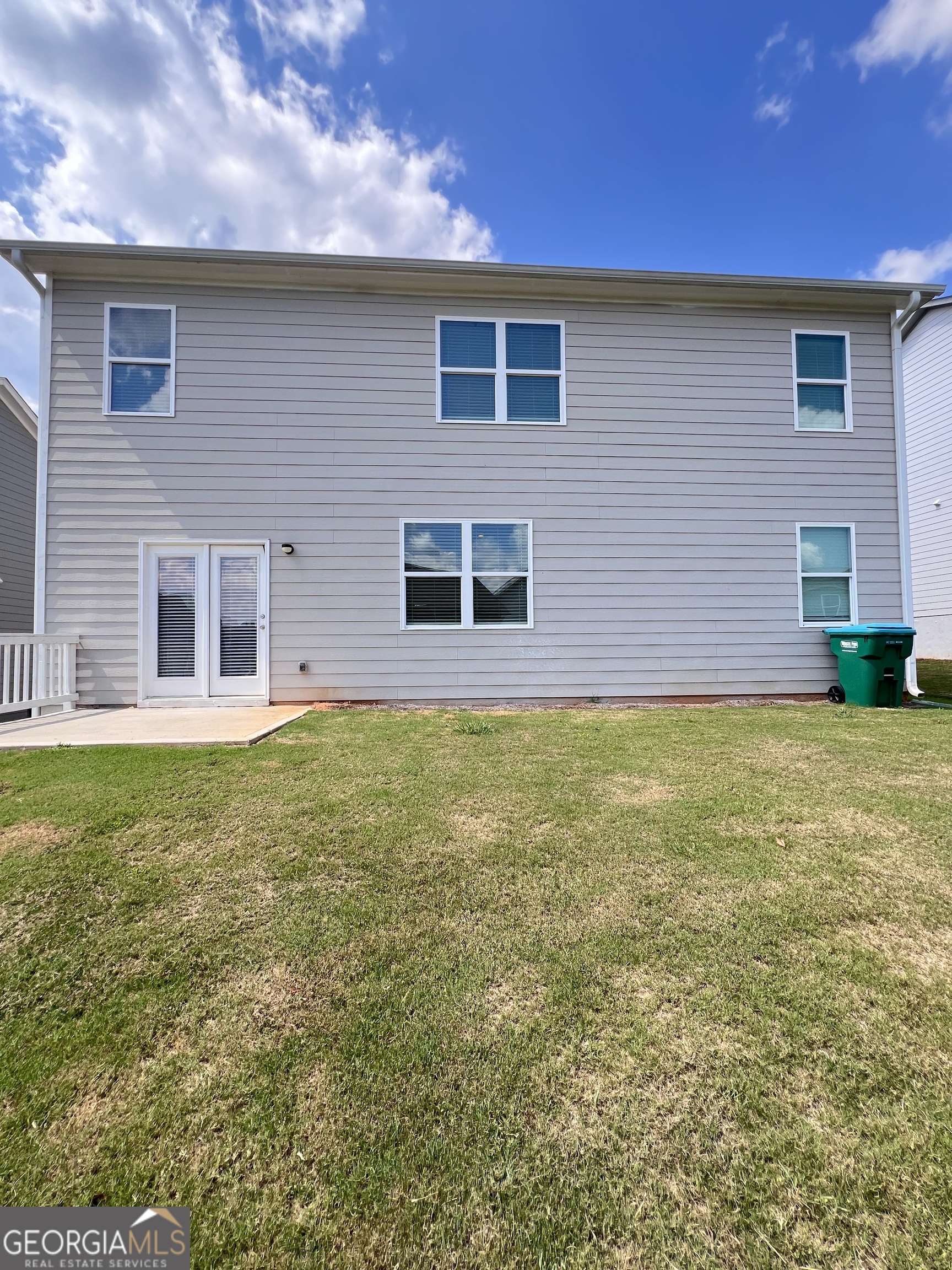 393 Walnut Grove Way Pendergrass, GA 30567 - Photo 22 of 22 a house view with a garden space
