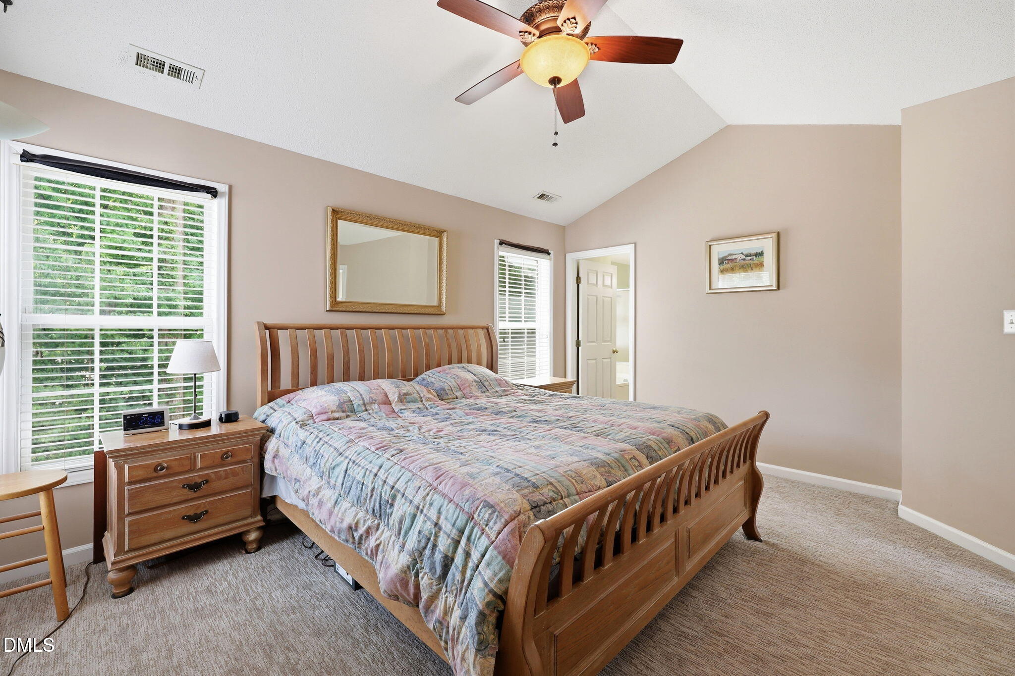 9105 Willow Valley Court Raleigh, NC 27617 - Photo 28 of 51 a bed room with a bed and a window