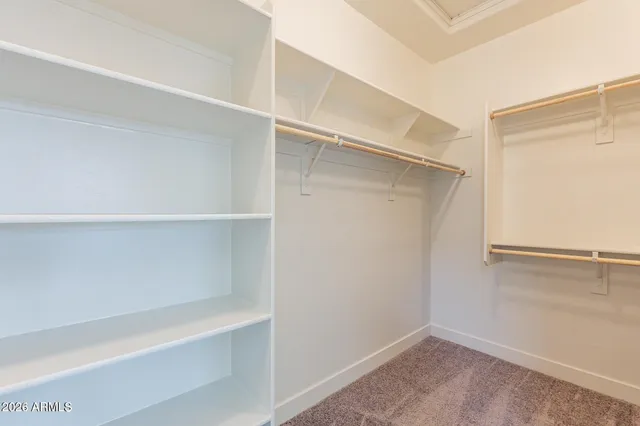 a view of an empty walk in closet