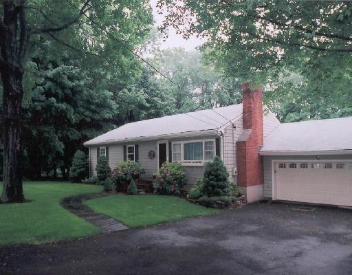 88 Soundview Road Ridgefield, CT 06877 - Photo 1 of 1 a view of a house with garden