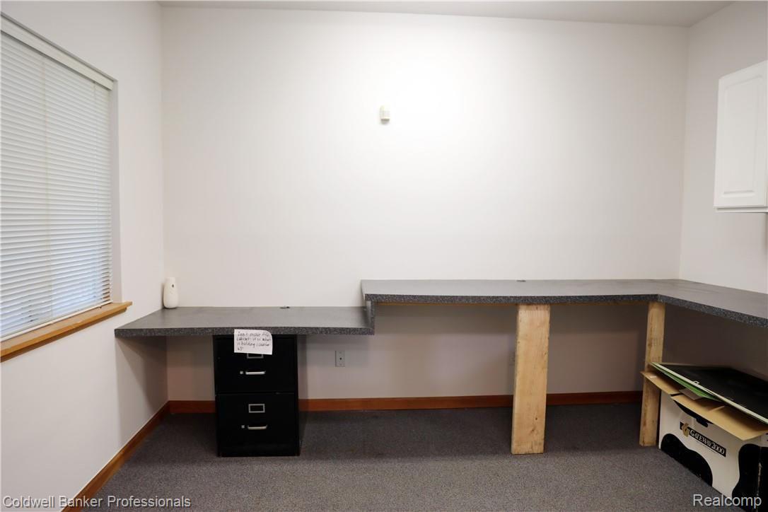 9840 Norman Road Clarkston, MI 48348 - Photo 43 of 45 Plenty of space for records and display.