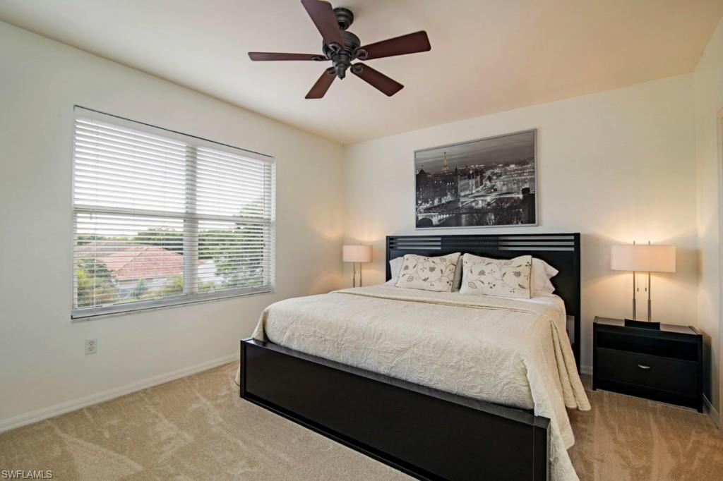 519 Roma Court, Unit 3301 Naples, FL 34110 - Photo 6 of 14 a bedroom with a bed and a window