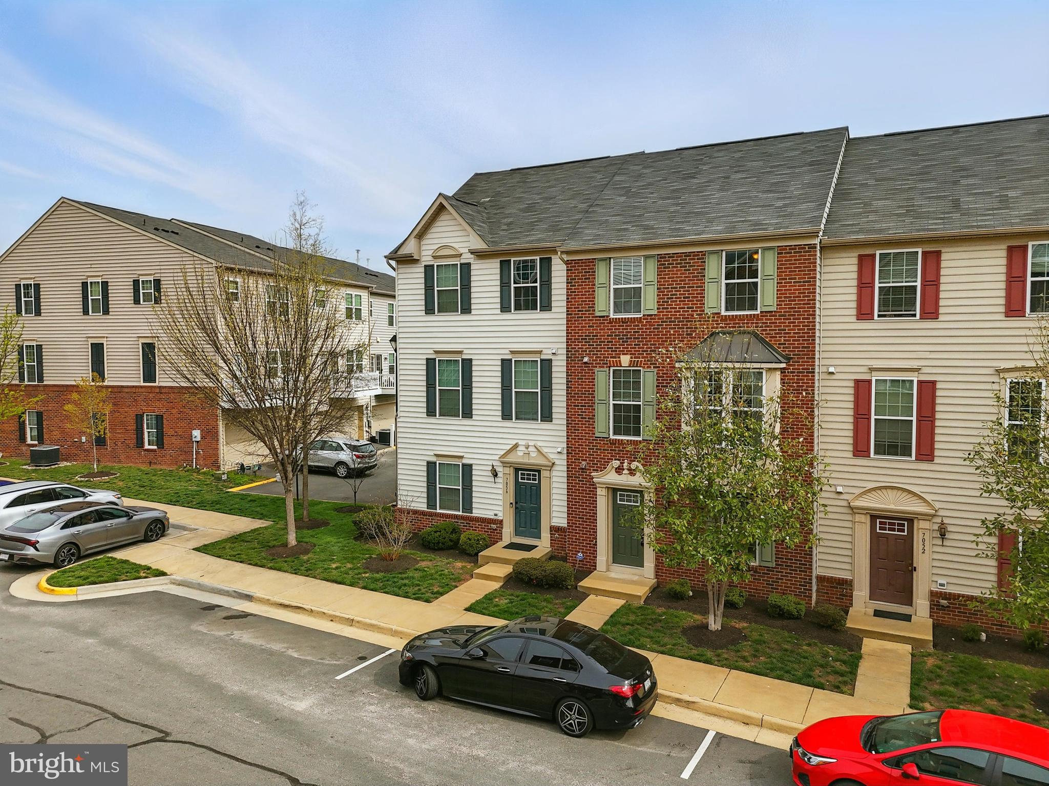 7054 Kona Drive Gainesville, VA 20155 - Photo 3 of 39 a car parked in front of a white house