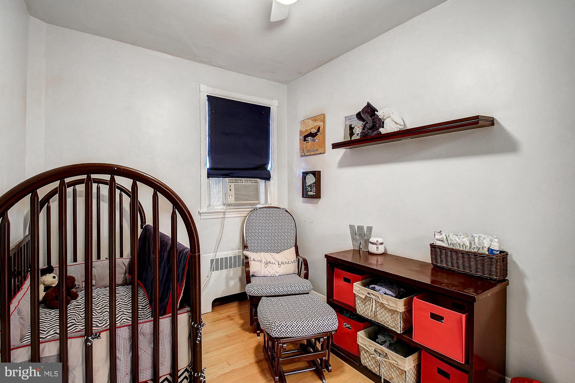 305 Dumbarton Road Baltimore, MD 21212 - Photo 22 of 30 a living room with furniture and a wooden floor