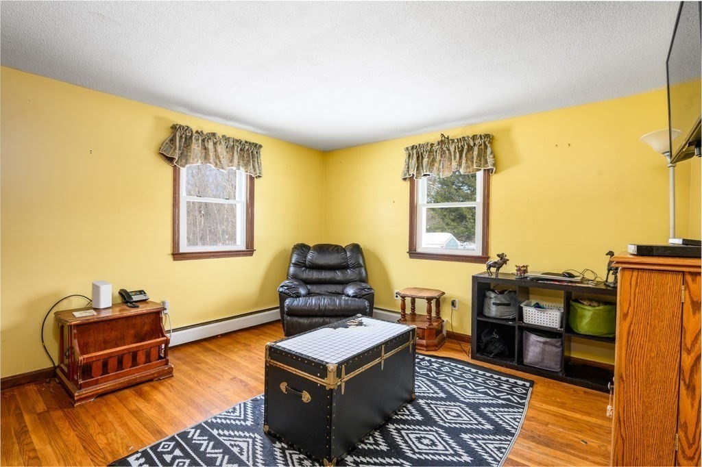 53 Birch Meadow Road Merrimac, MA 01860 - Photo 15 of 38 a living room with furniture and a window
