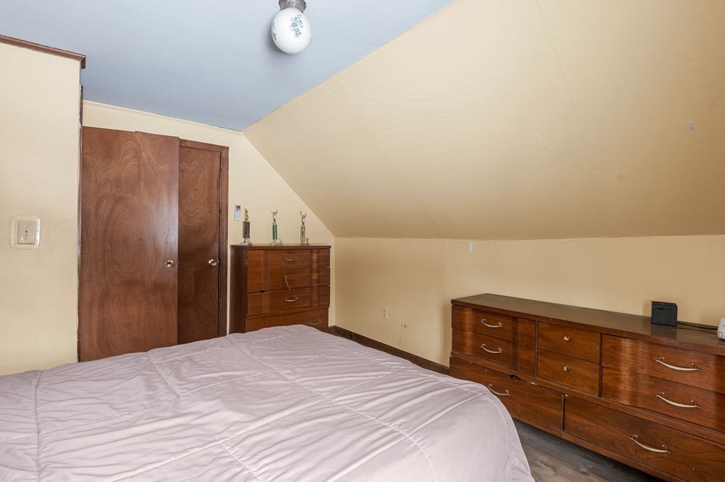 53 Birch Meadow Road Merrimac, MA 01860 - Photo 24 of 38 a bedroom with a bed and a dresser