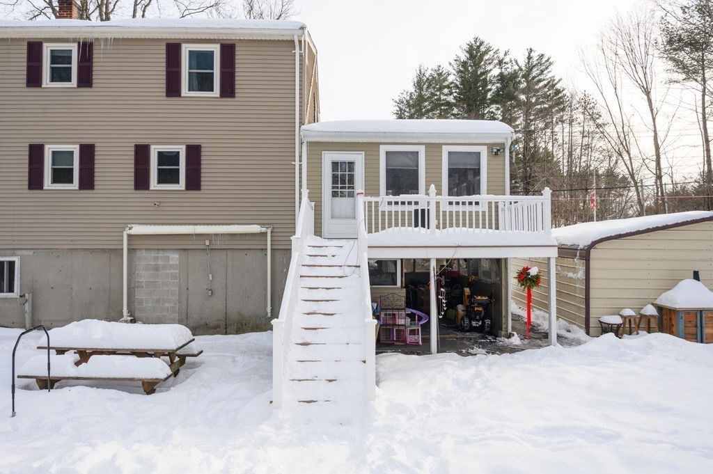 53 Birch Meadow Road Merrimac, MA 01860 - Photo 29 of 38 a view of a house with a patio and a yard