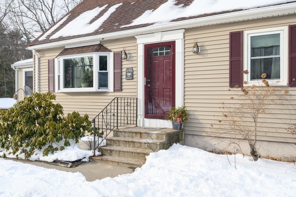 53 Birch Meadow Road Merrimac, MA 01860 - Photo 3 of 38 a view of a house with a yard and chair