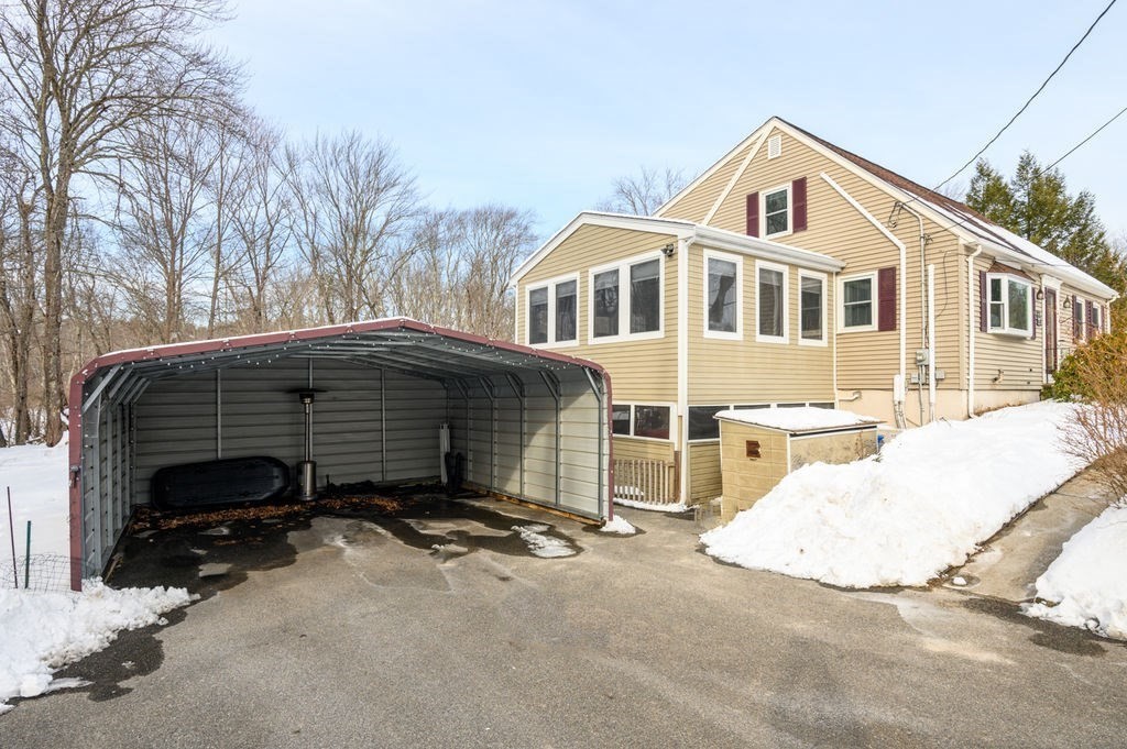 53 Birch Meadow Road Merrimac, MA 01860 - Photo 33 of 38 a front view of a house with a yard