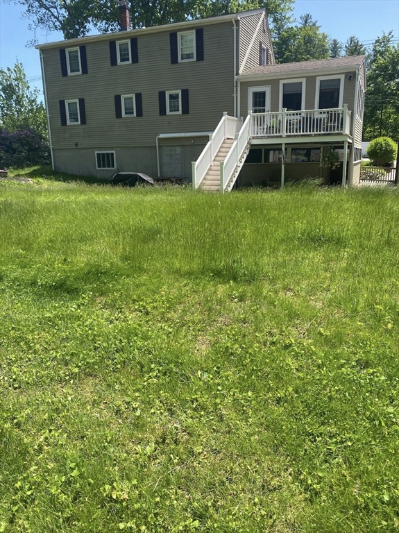 53 Birch Meadow Road Merrimac, MA 01860 - Photo 34 of 38 a view of a house with backyard porch and furniture
