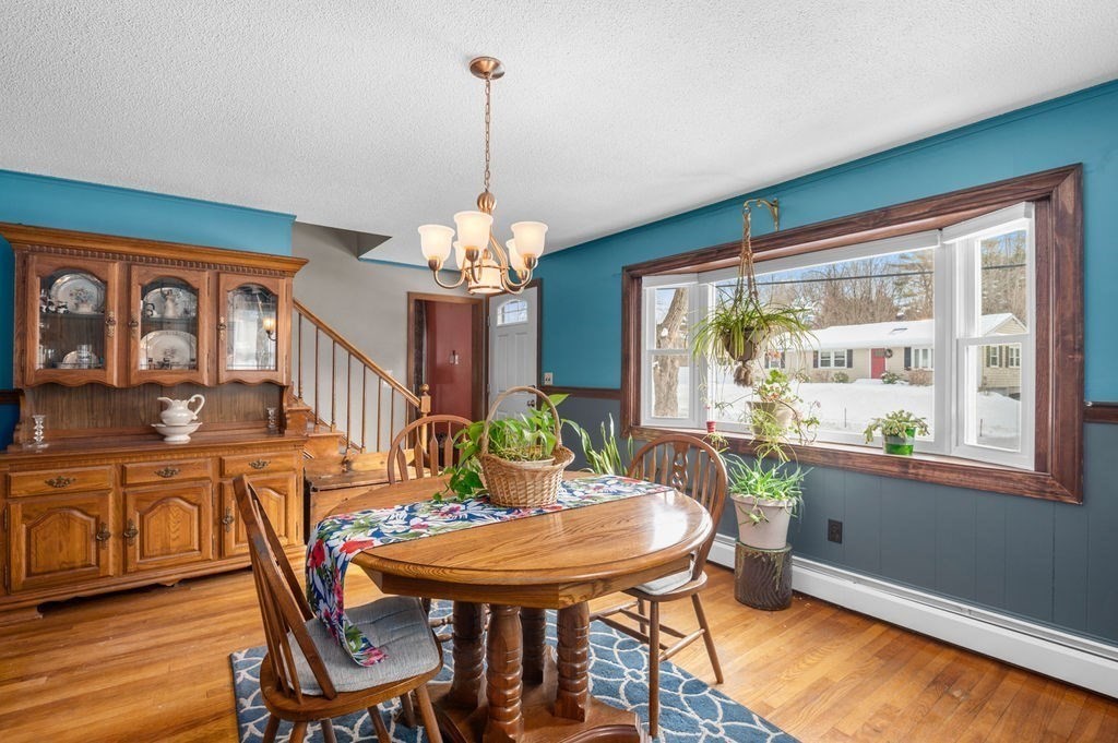 53 Birch Meadow Road Merrimac, MA 01860 - Photo 5 of 38 a view of a dining room with furniture window and wooden floor