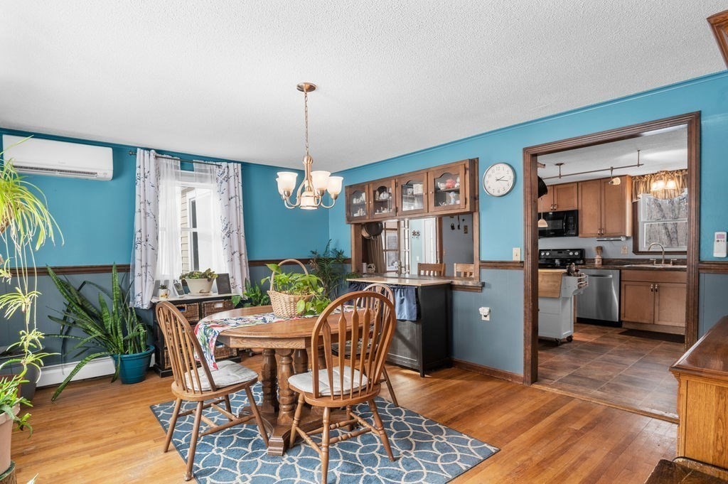 53 Birch Meadow Road Merrimac, MA 01860 - Photo 6 of 38 a view of a dining room with furniture window and wooden floor