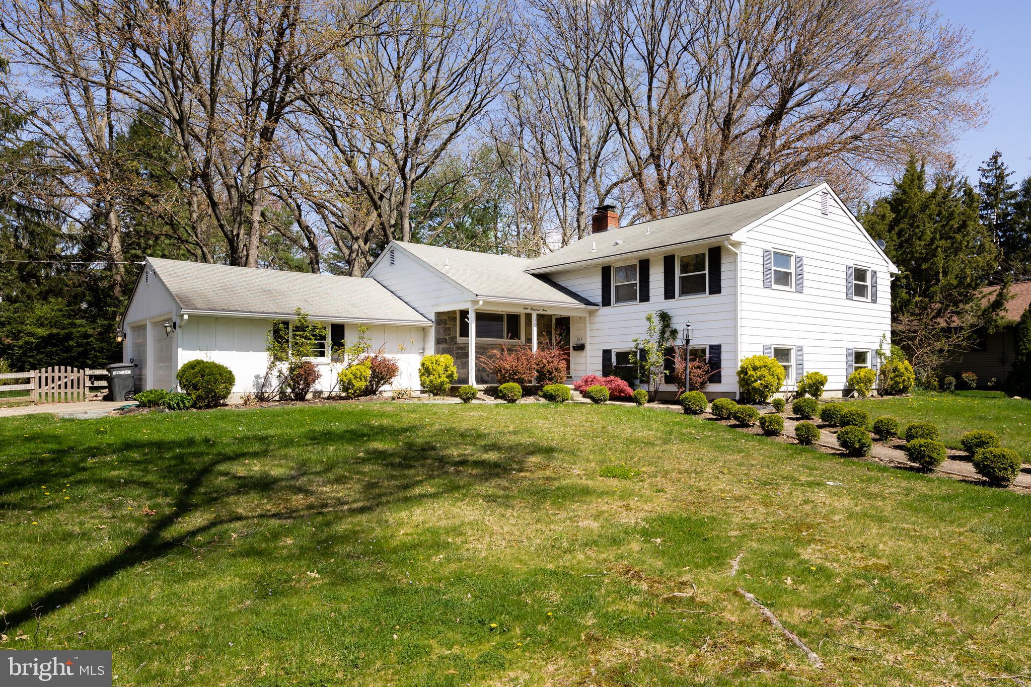 104 Sharrowvale Road Cherry Hill, NJ 08034 - Photo 1 of 37 a front view of a house with a yard table and chairs