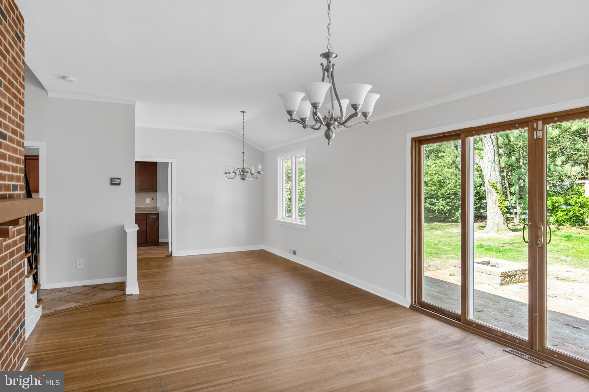 104 Sharrowvale Road Cherry Hill, NJ 08034 - Photo 11 of 37 a view of an empty room with window and wooden floor
