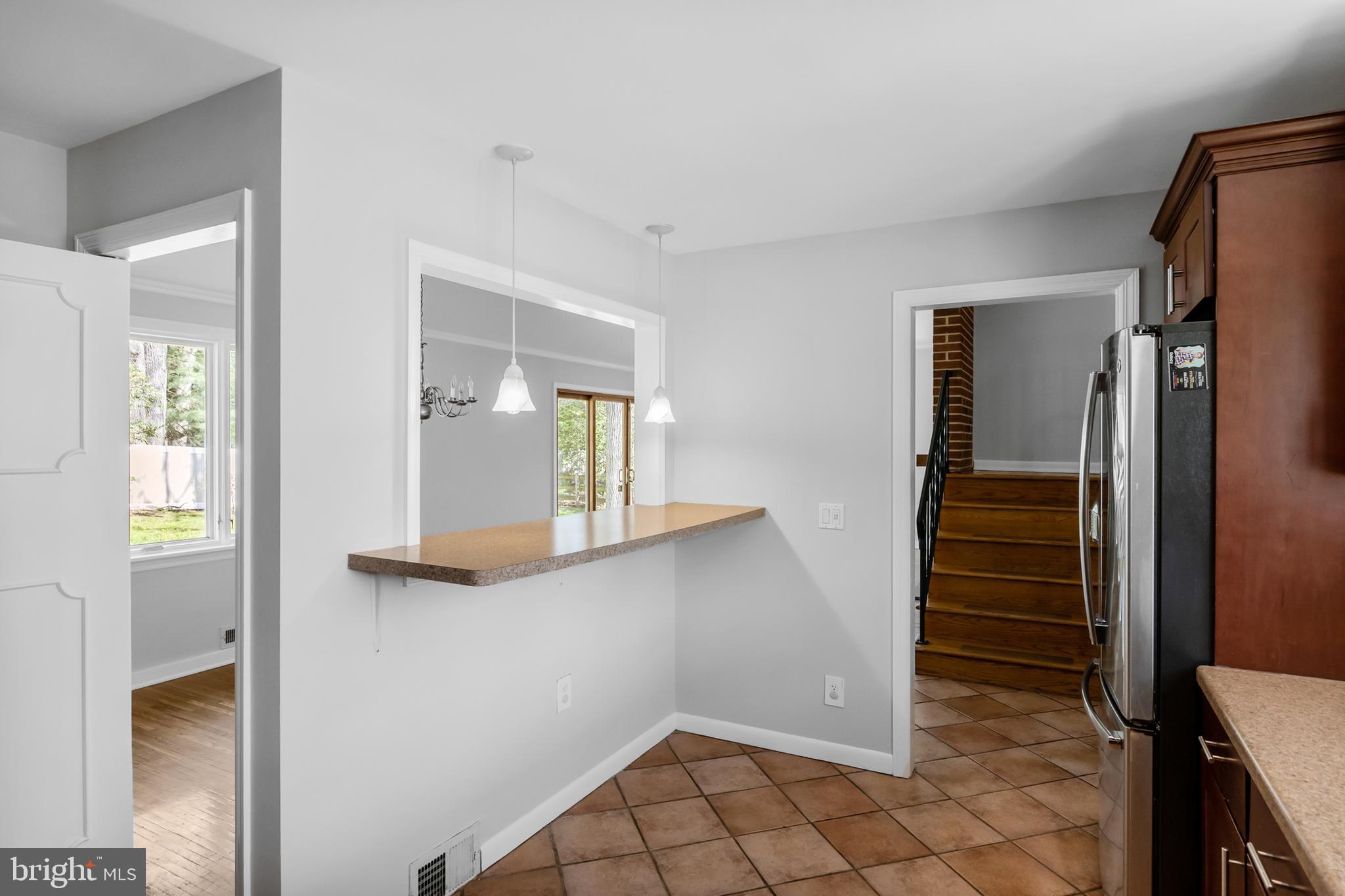 104 Sharrowvale Road Cherry Hill, NJ 08034 - Photo 16 of 37 a view of a livingroom with wooden floor and entryway