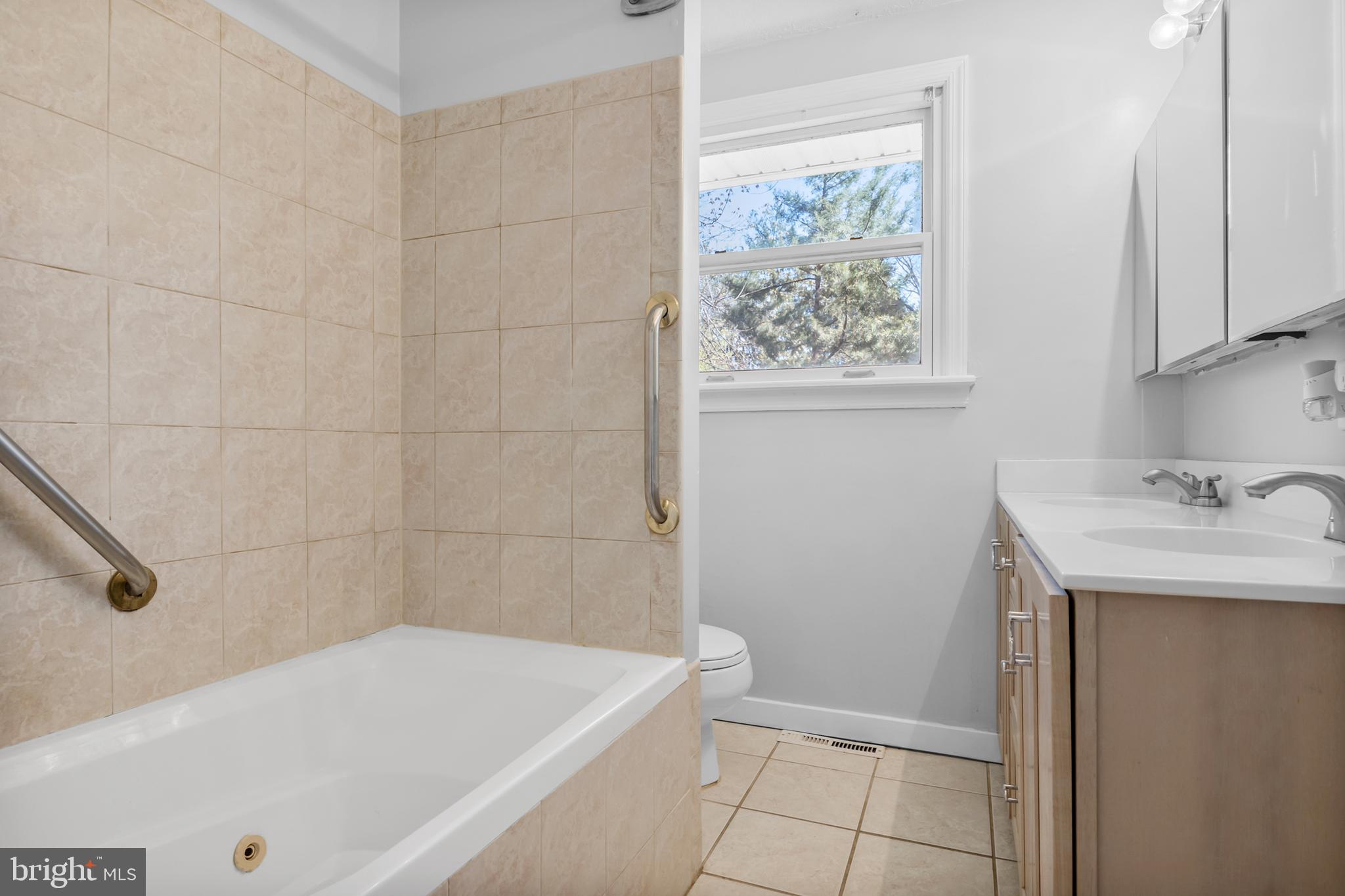 104 Sharrowvale Road Cherry Hill, NJ 08034 - Photo 26 of 37 a bathroom with a sink and a bathtub