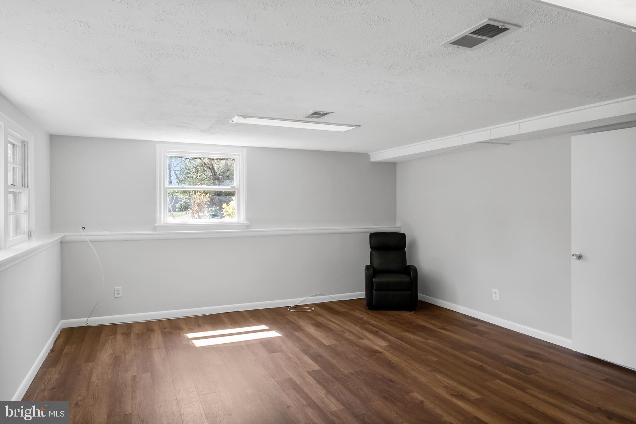 104 Sharrowvale Road Cherry Hill, NJ 08034 - Photo 29 of 37 a view of empty room with wooden floor
