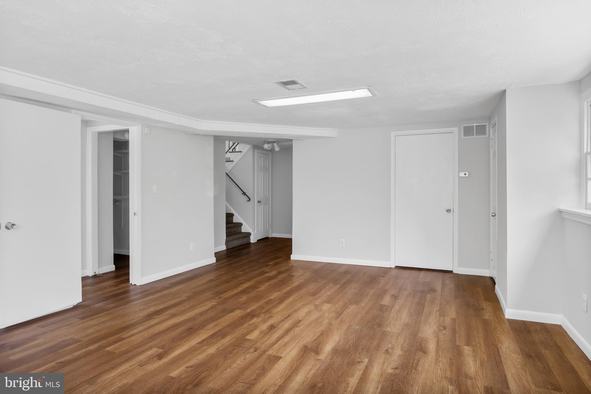 104 Sharrowvale Road Cherry Hill, NJ 08034 - Photo 30 of 37 a view of an empty room with wooden floor