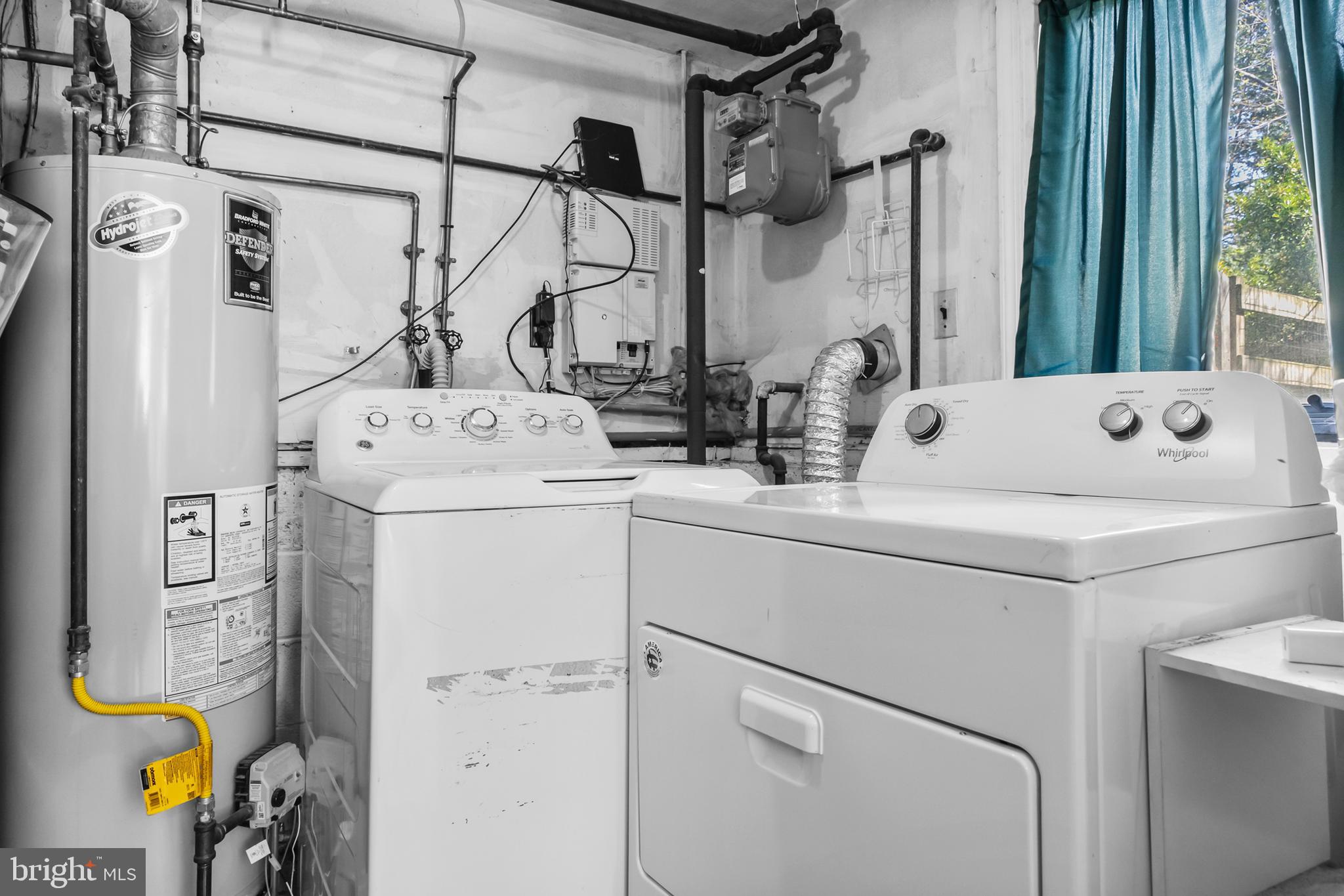 104 Sharrowvale Road Cherry Hill, NJ 08034 - Photo 34 of 37 a utility room with dryer and washer