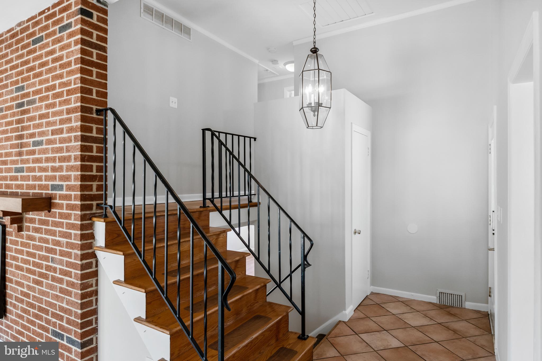 104 Sharrowvale Road Cherry Hill, NJ 08034 - Photo 5 of 37 a view of entryway and hall with wooden floor