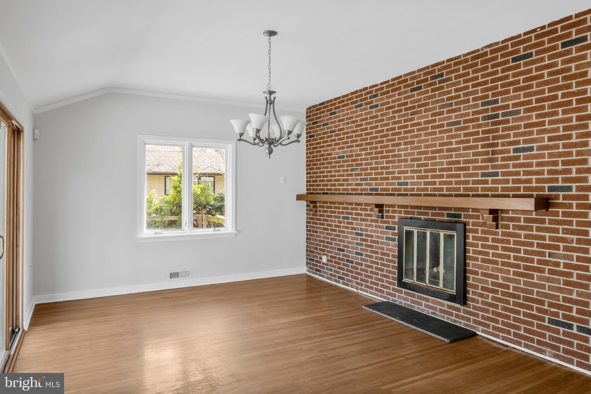 104 Sharrowvale Road Cherry Hill, NJ 08034 - Photo 8 of 37 a view of a livingroom with wooden floor and staircase
