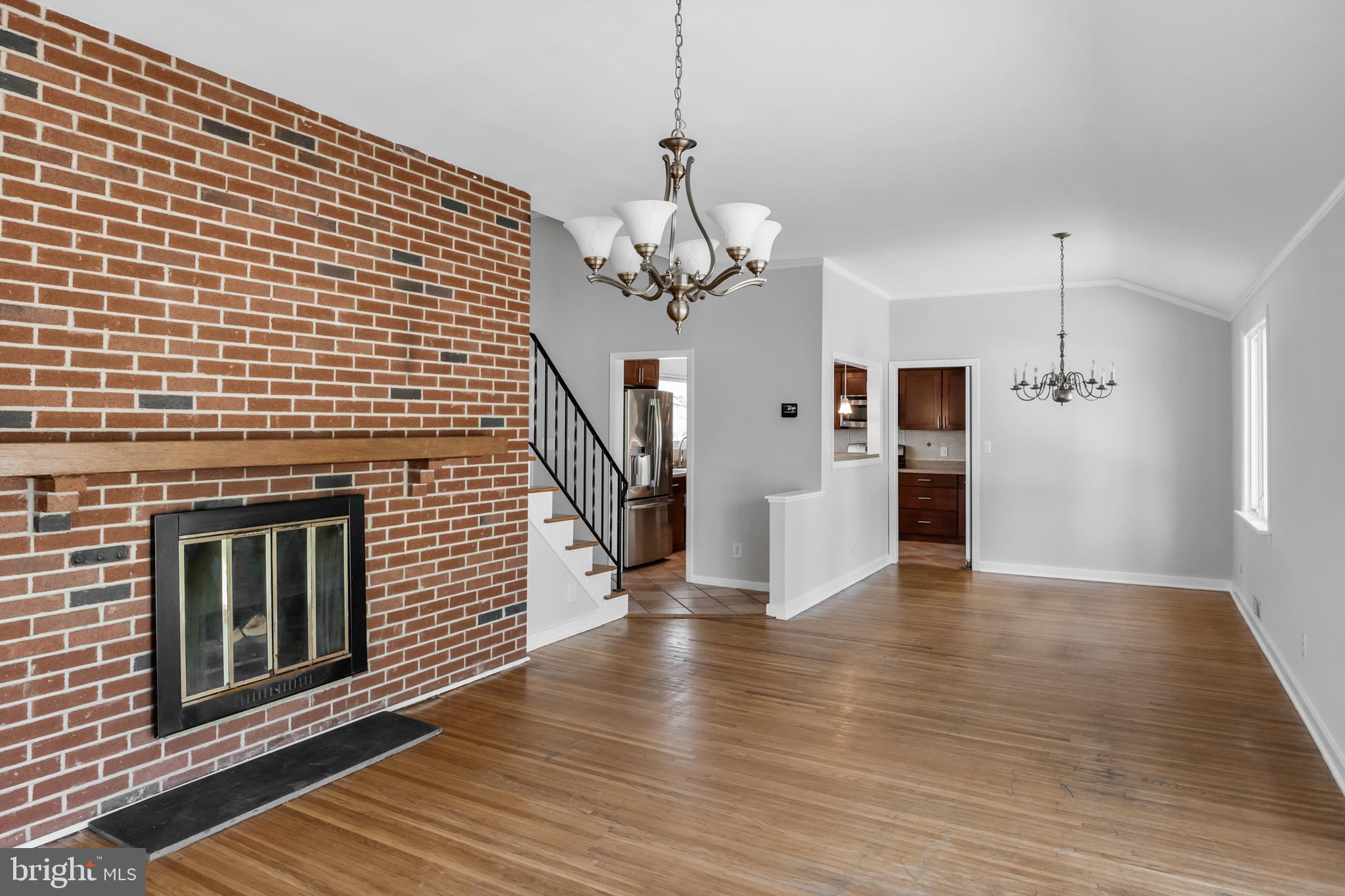 104 Sharrowvale Road Cherry Hill, NJ 08034 - Photo 10 of 37 a view of a kitchen with wooden floor and a kitchen