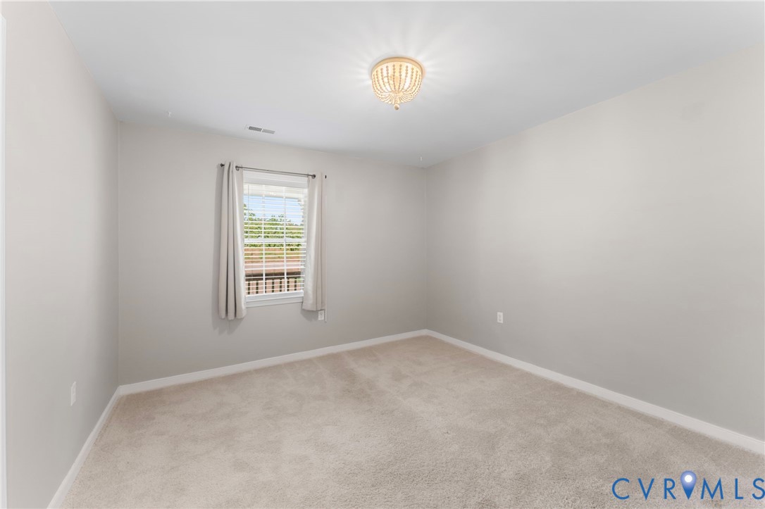 1146 Indian Valley Road Heathsville, VA 22473 - Photo 22 of 45 a view of an empty room with a window