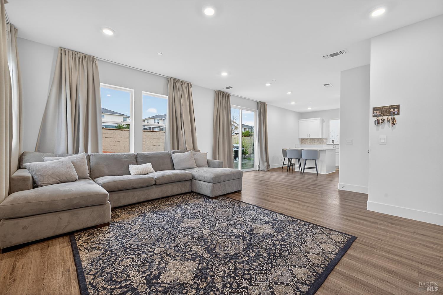 6042 Oxford Place Rohnert Park, CA 94928 - Photo 2 of 31 a living room with furniture and a rug