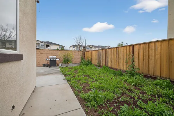 a view of a terrace with a garden