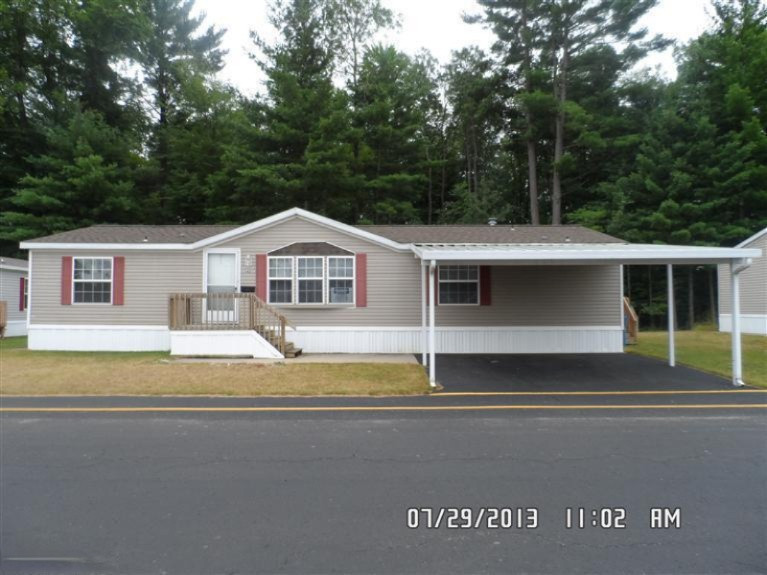 542 East Rainbow Road Newaygo, MI 49337 - Photo 1 of 23 Primary Photo